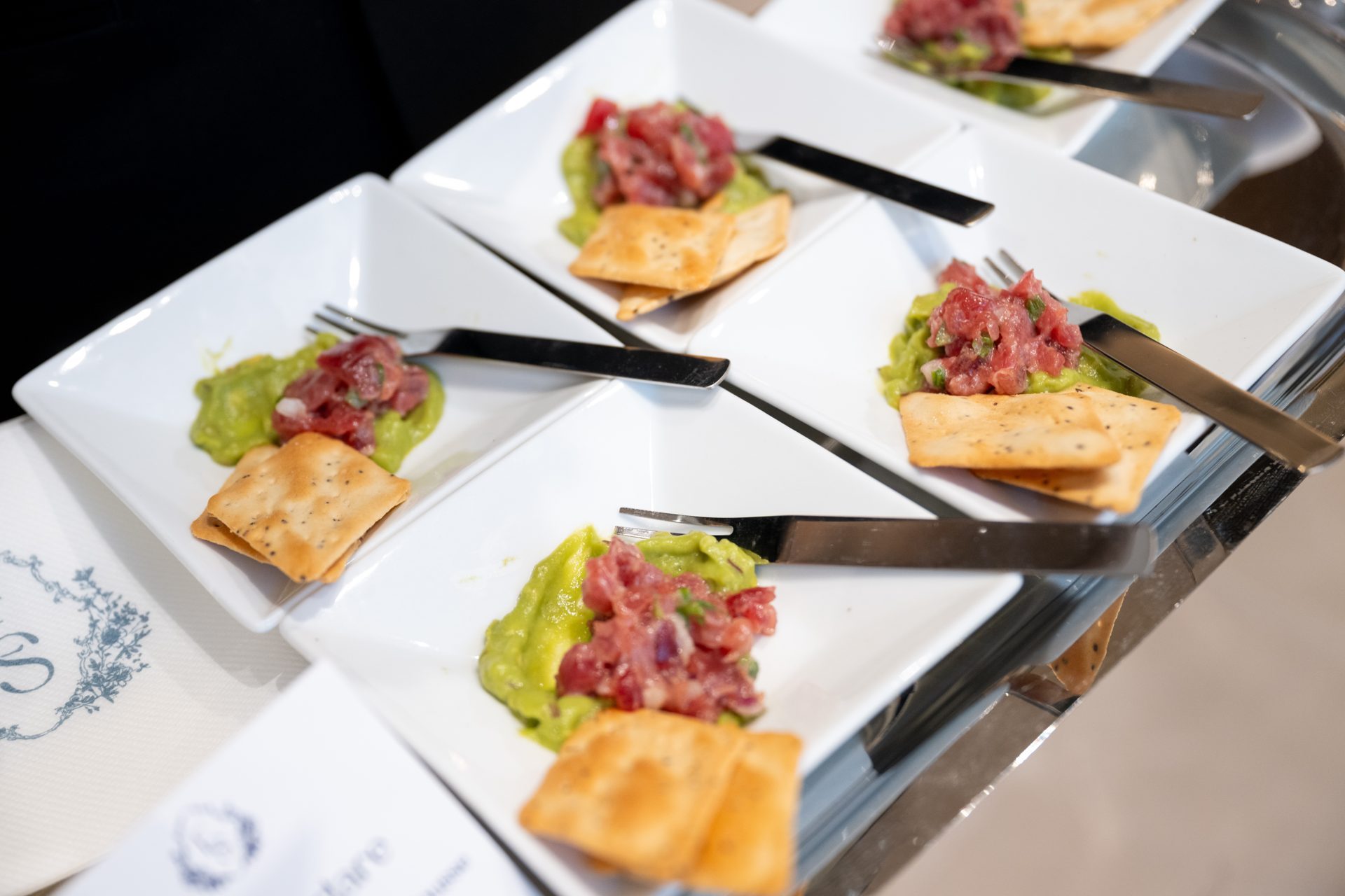Tuna tartare passed on white plates