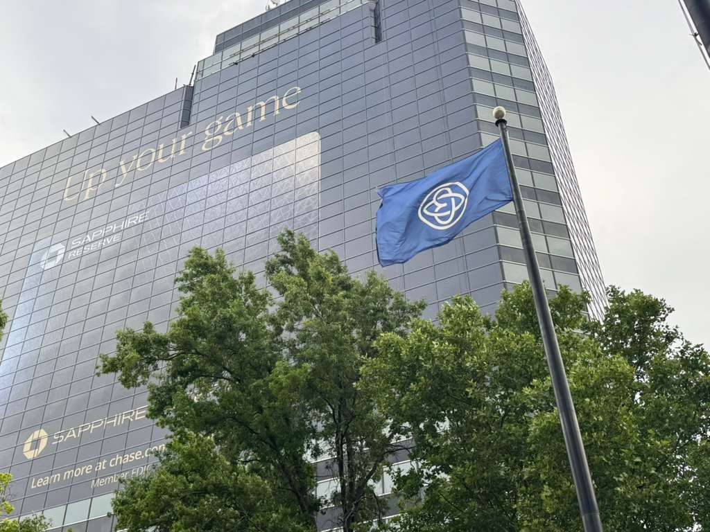 The World of Blue flag flying in front of the hotel